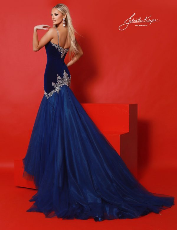 Back view of royal blue mermaid gown with embellished details. Floor length gown with silver beaded back design and layered tulle skirt, designed for statement entrances, homecoming court, and runway glamour.